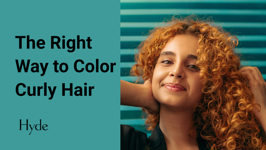 Smiling woman with light auburn curly hair being styled, with text reading “The Right Way to Color Curly Hair” by Hyde Salon on a teal background.
