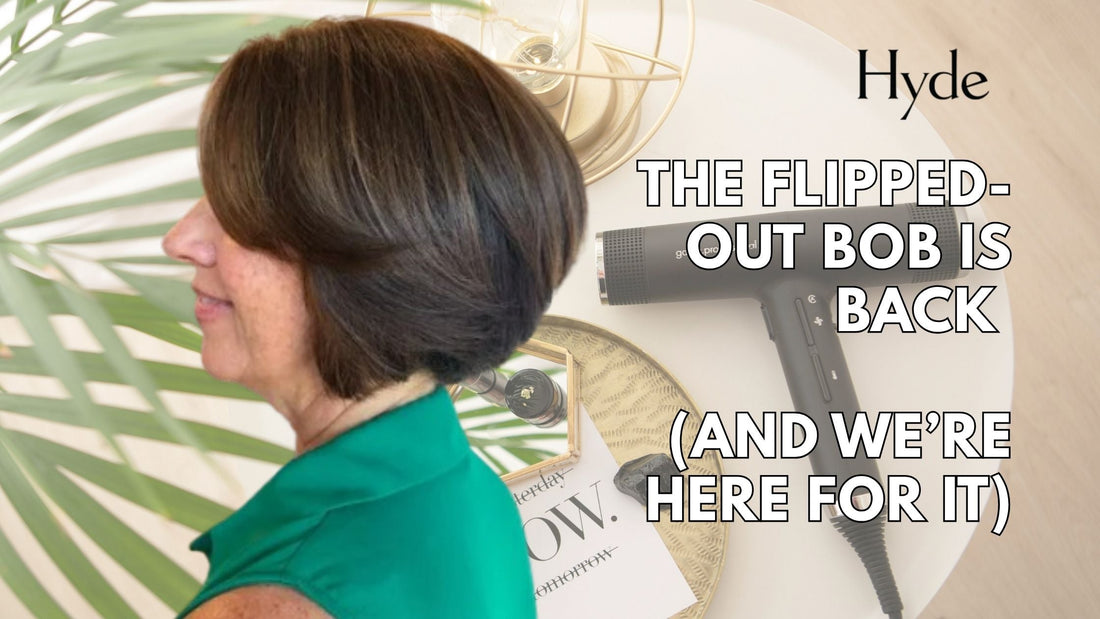 Woman with a stylish flipped-out bob haircut smiling at Hyde Vista Salon.