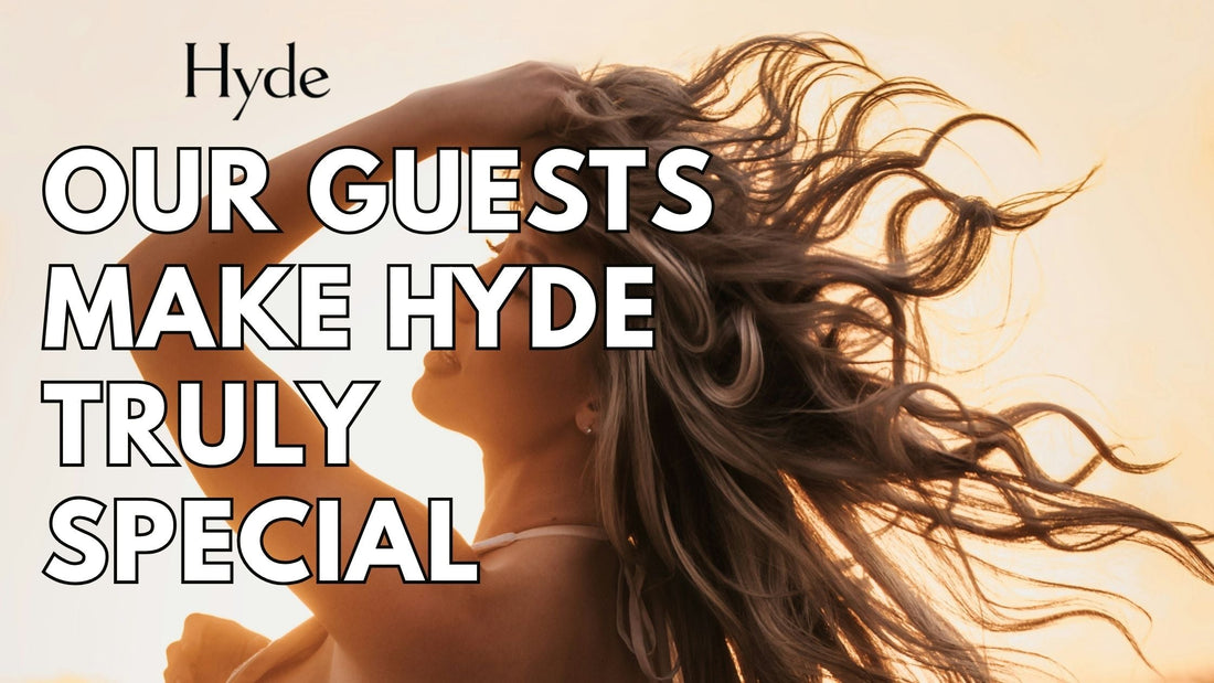 Smiling Hyde Salon stylist with guest in the Columbia salon.