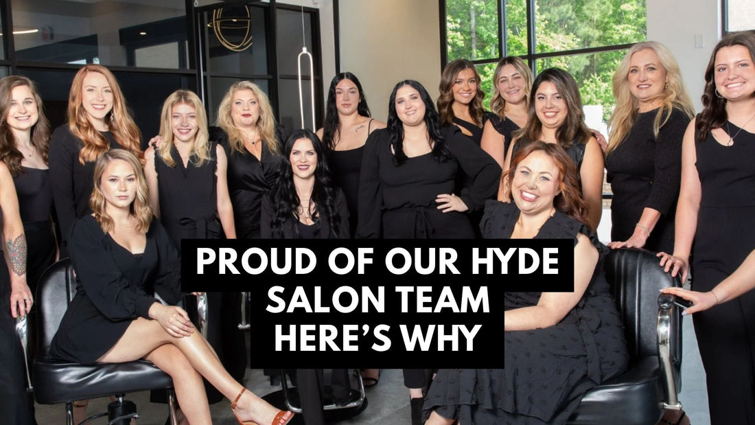 Hyde Salon stylists smiling together inside the Columbia salon.